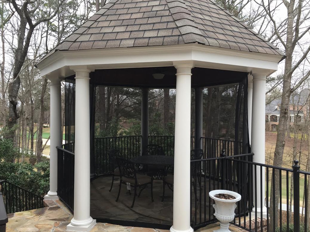 gazebo with screens and curtains